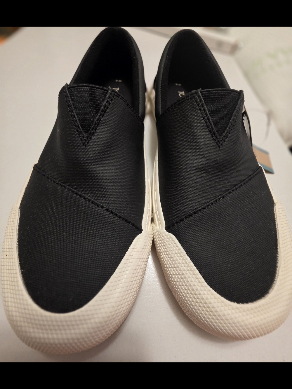 Toms Black Slip-On Canvas Loafers with White Sole